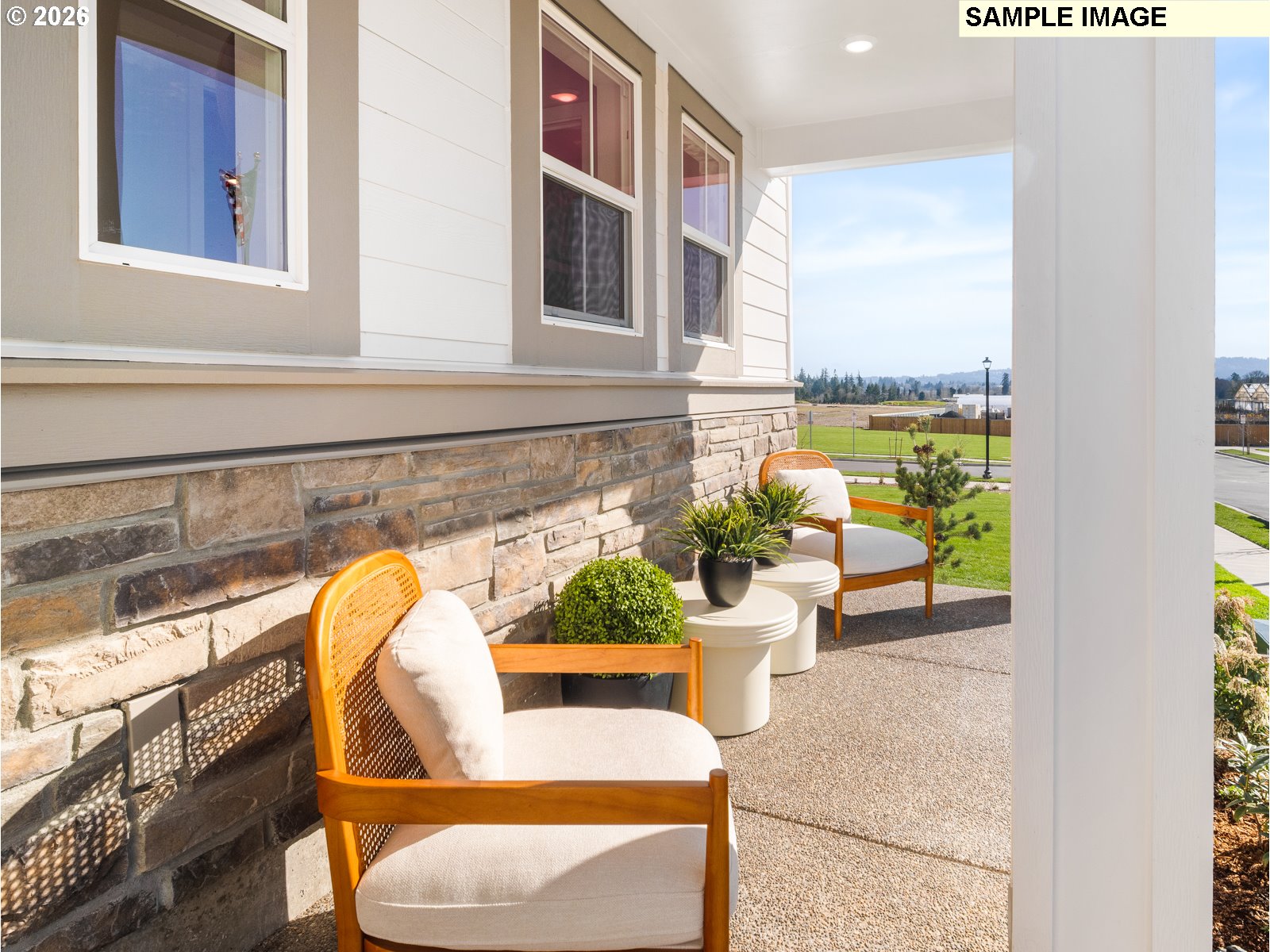 18218 Southwest Tippery Lane Beaverton, OR 97003 - Photo 4 of 21 a view of a patio with couches and potted plants