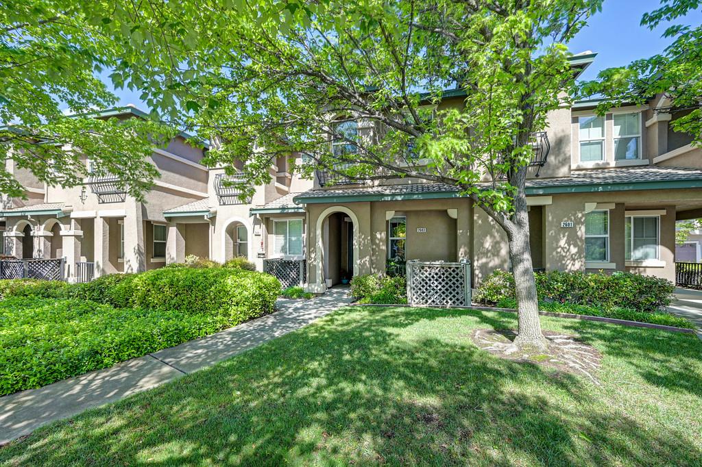 front view of a house with a yard