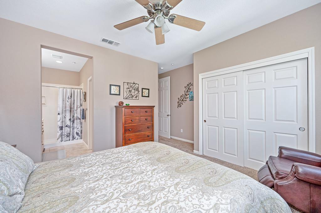 2603 Las Palomas Loop Lincoln, CA 95648 - Photo 19 of 28 a bedroom with a bed and a dresser