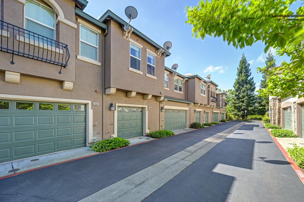 2603 Las Palomas Loop Lincoln, CA 95648 - Photo 25 of 28 a view of a street with brick building in front of it