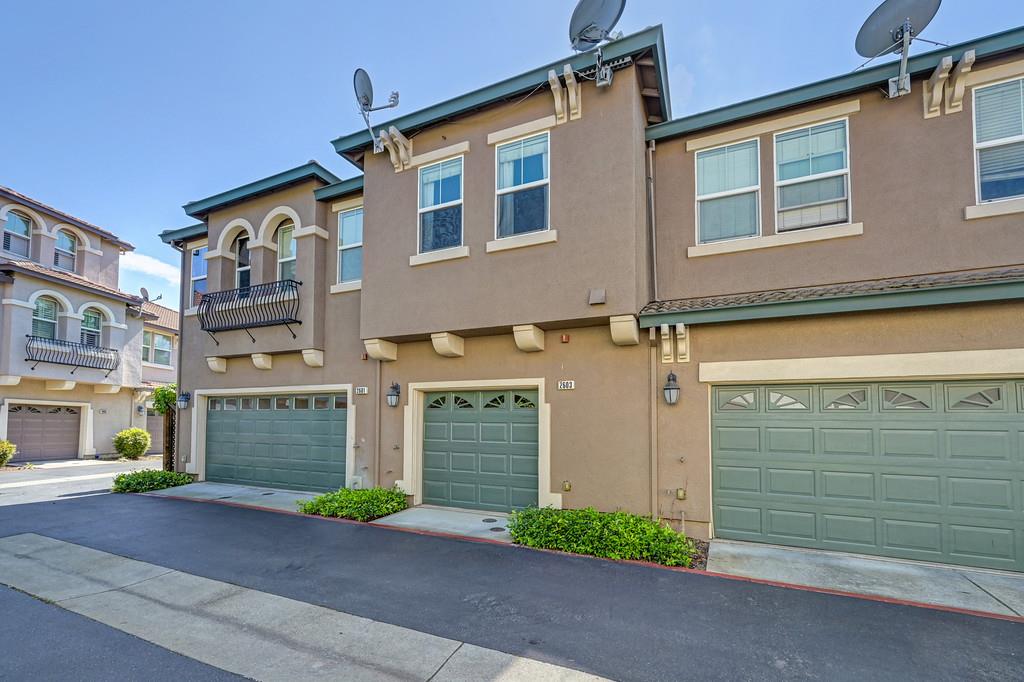 2603 Las Palomas Loop Lincoln, CA 95648 - Photo 26 of 28 a front view of a house with a yard and garage