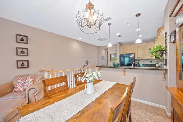 a view of a dining room with furniture