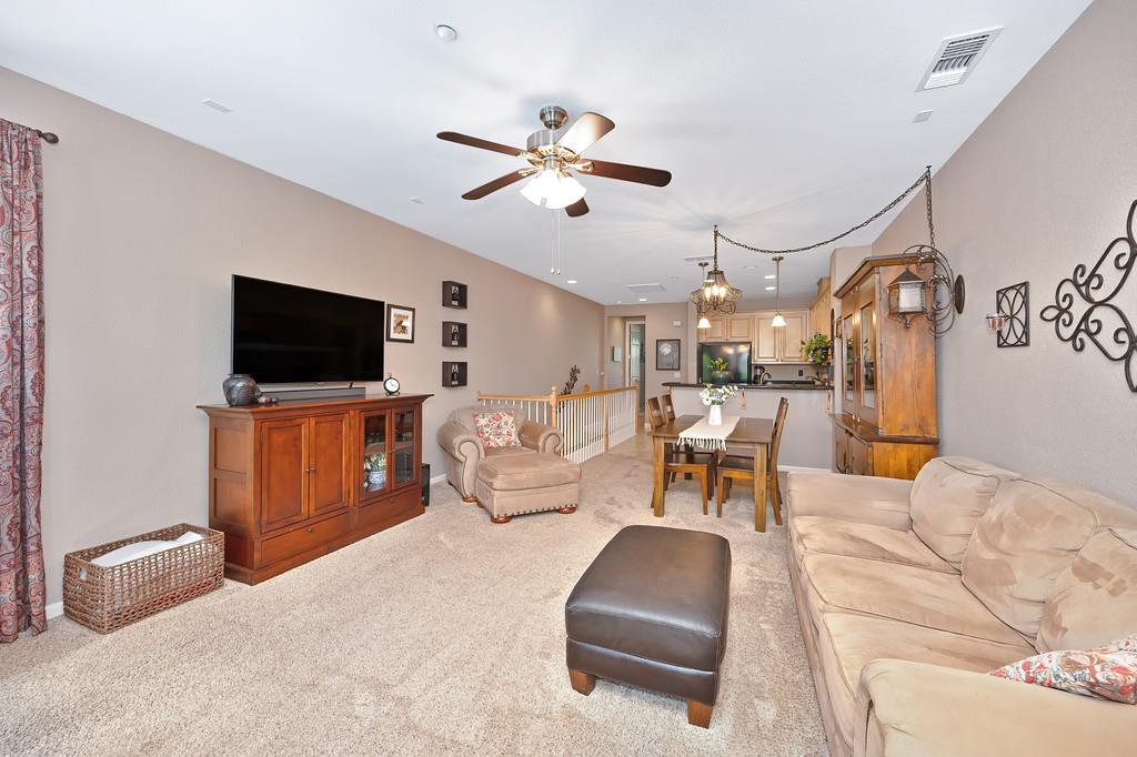 2603 Las Palomas Loop Lincoln, CA 95648 - Photo 9 of 28 a living room with furniture and a flat screen tv