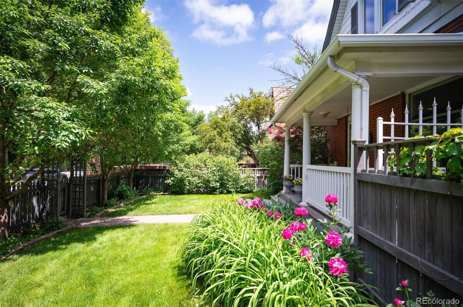 1324 South University Boulevard Denver, CO 80210 - Photo 28 of 47 a view of flower garden in front of house