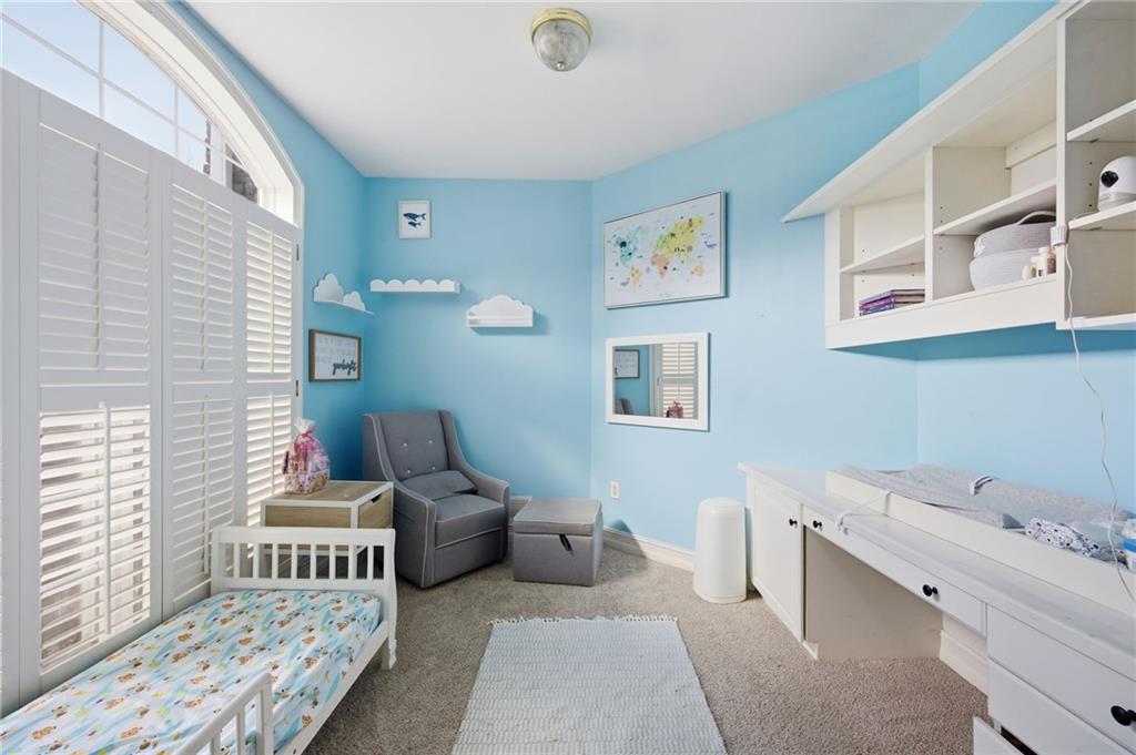 7387 Milam Road Winston, GA 30187 - Photo 29 of 41 a bedroom with furniture and a window