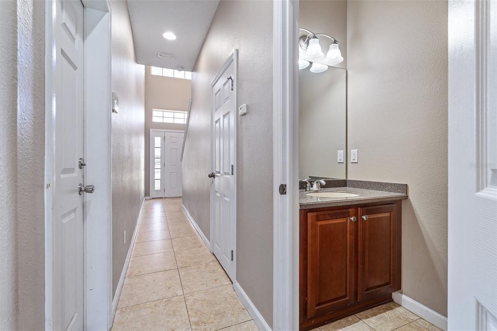 1929 Cove Point Road Port Orange, FL 32128 - Photo 16 of 45 a view of a hallway with wooden floor