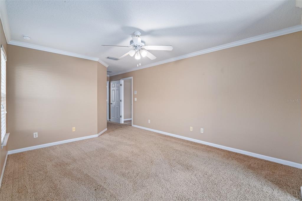 1929 Cove Point Road Port Orange, FL 32128 - Photo 21 of 45 a view of an empty room with a window