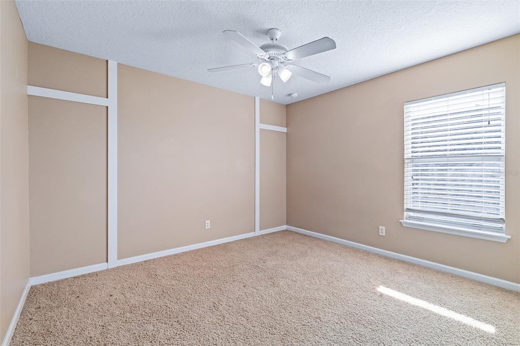 1929 Cove Point Road Port Orange, FL 32128 - Photo 25 of 45 a view of an empty room with a window