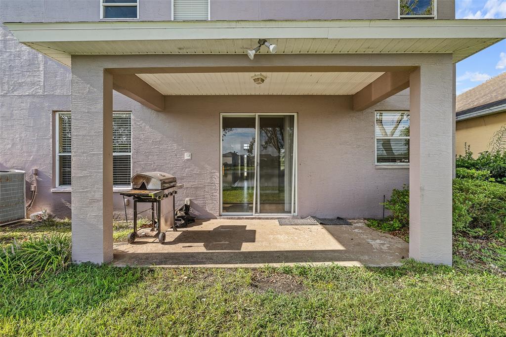 1929 Cove Point Road Port Orange, FL 32128 - Photo 34 of 45 a front view of a house with a yard