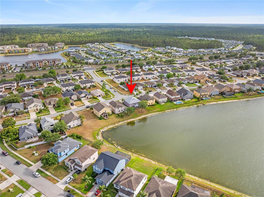 1929 Cove Point Road Port Orange, FL 32128 - Photo 44 of 45 an aerial view of residential houses with outdoor space