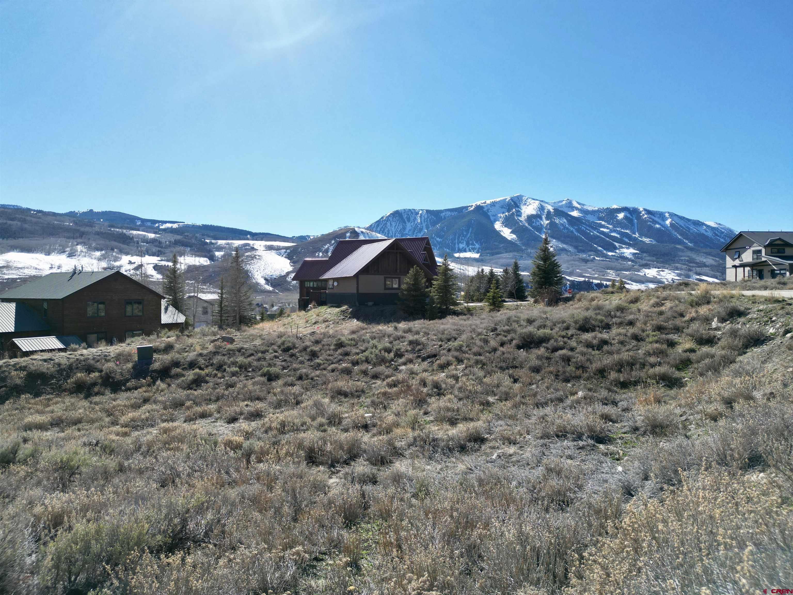 162 Bryant Avenue Crested Butte, CO 81224 - Photo 17 of 19 a view of a house with a yard