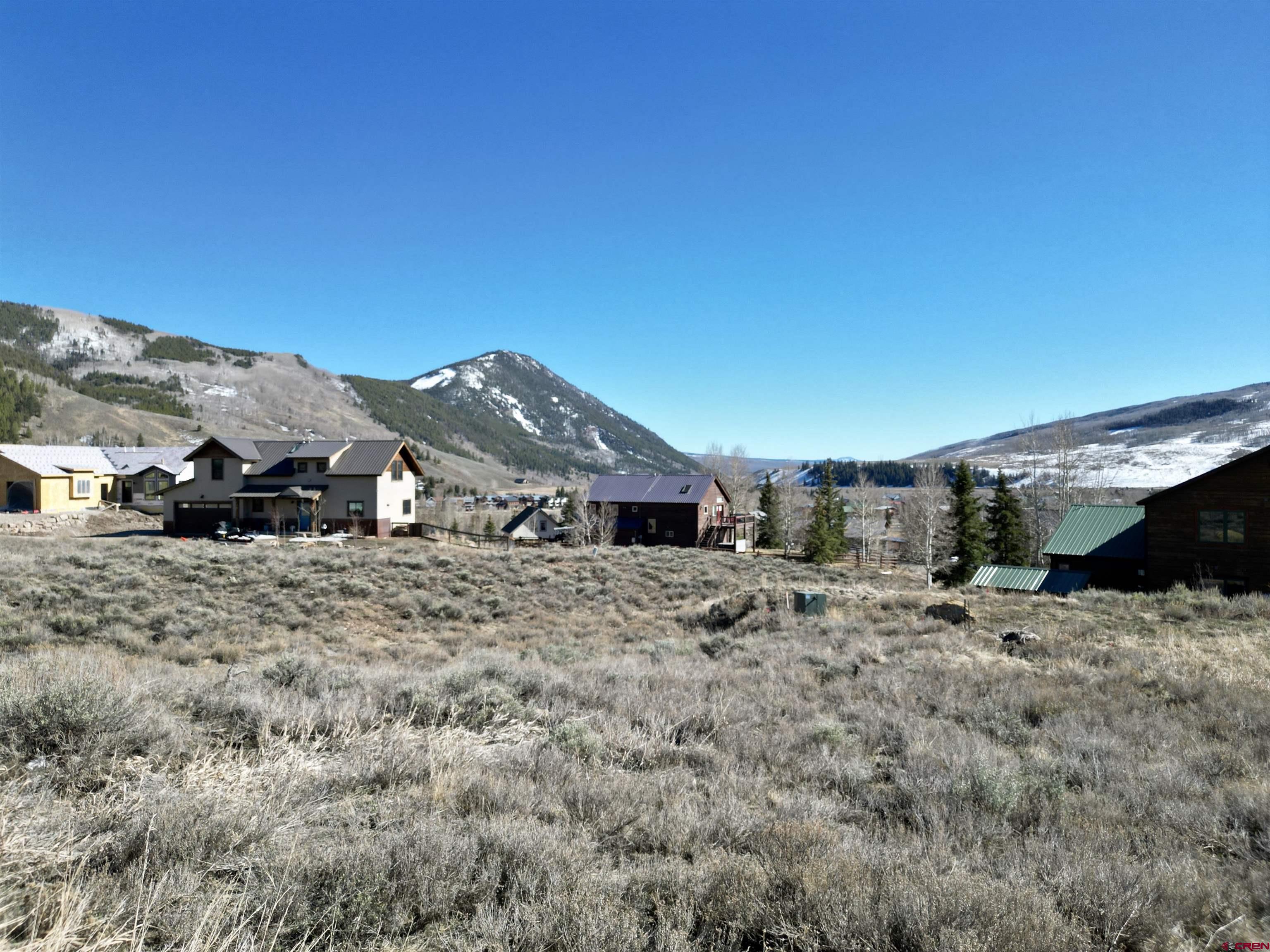 162 Bryant Avenue Crested Butte, CO 81224 - Photo 19 of 19 a view of a house with a yard