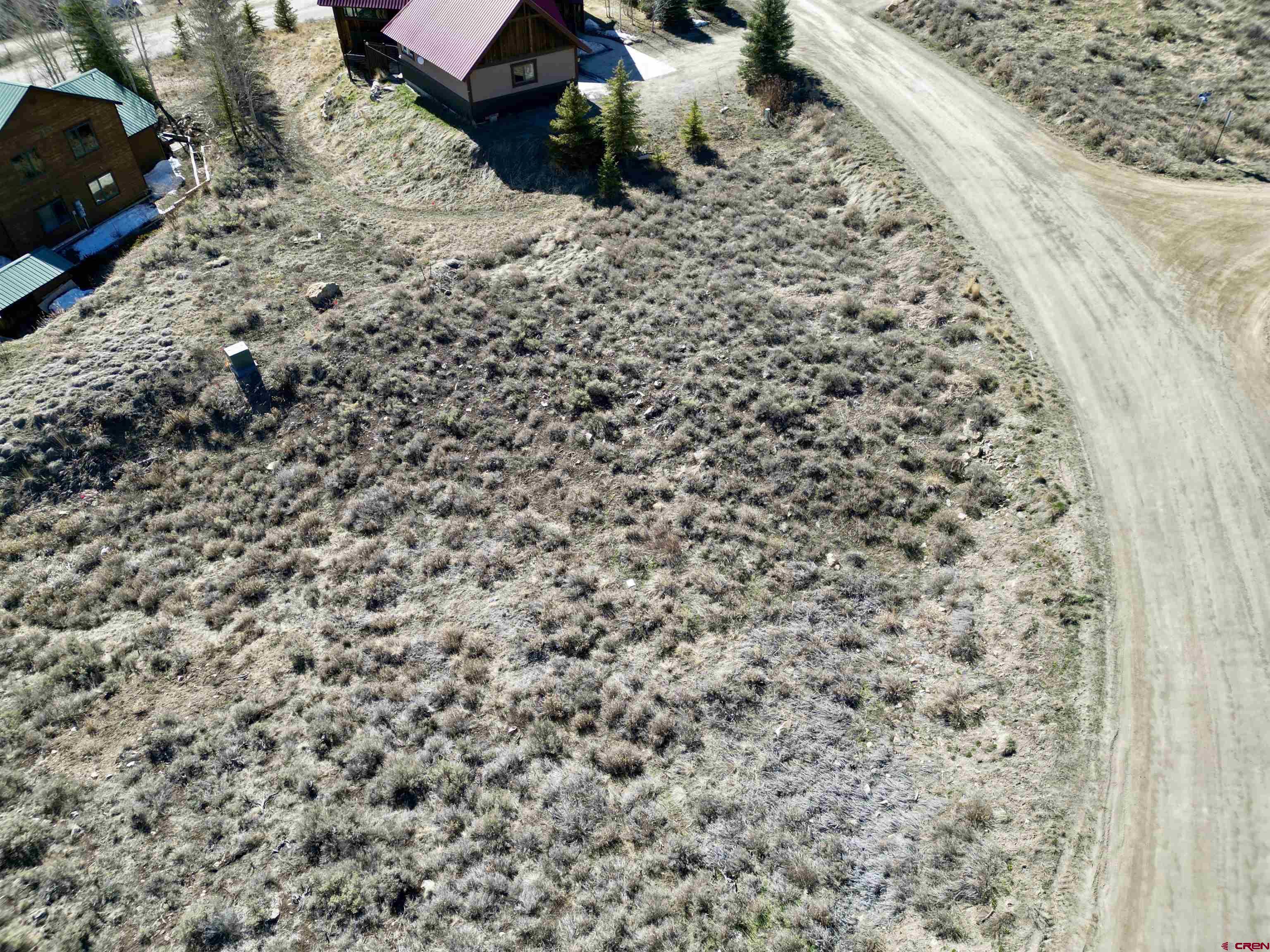 162 Bryant Avenue Crested Butte, CO 81224 - Photo 5 of 19 a view of a backyard of the house