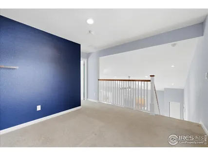 a view of a livingroom with a staircase