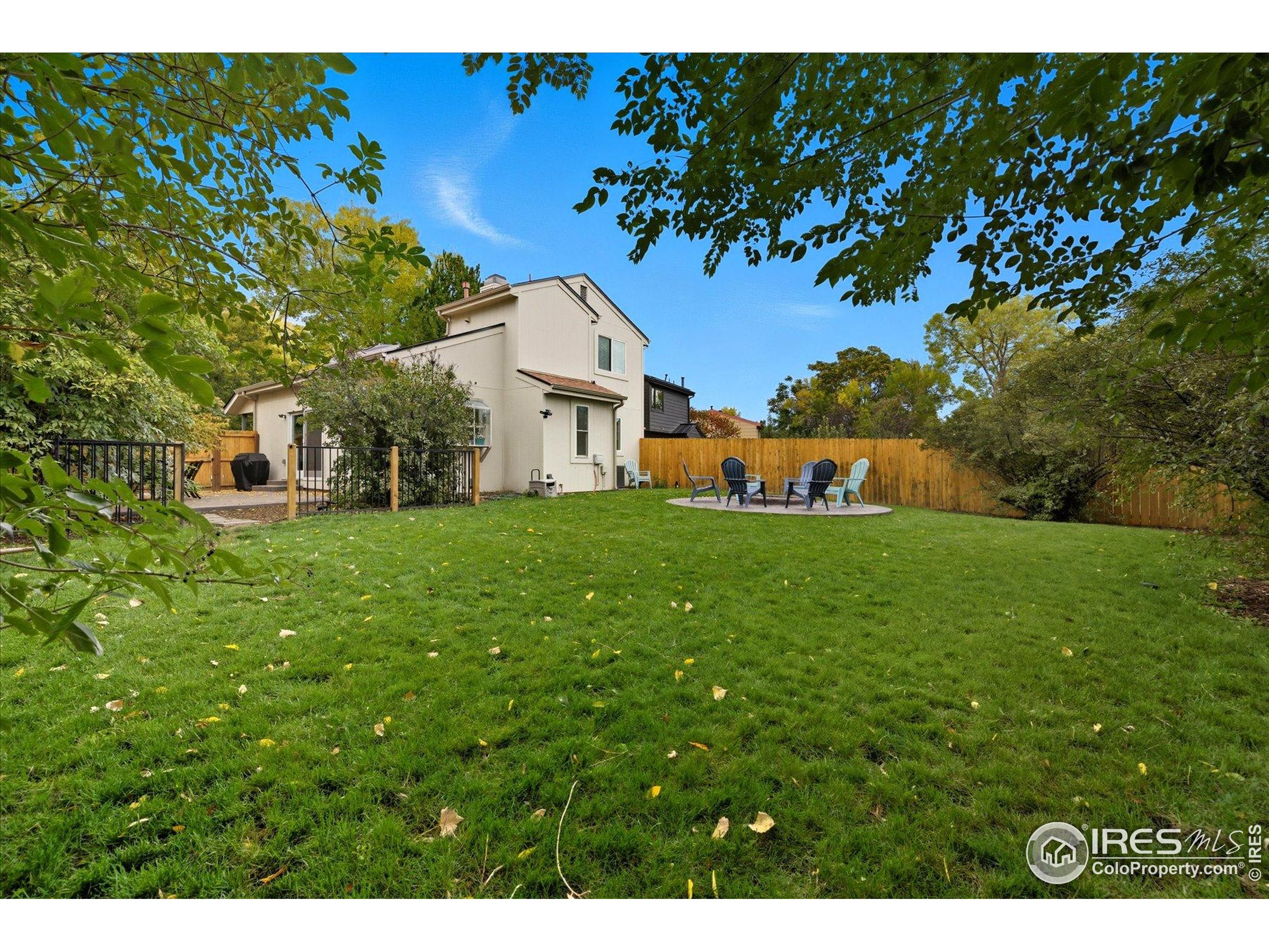 1812 Rice Street Longmont, CO 80501 - Photo 37 of 44 a front view of a house with garden