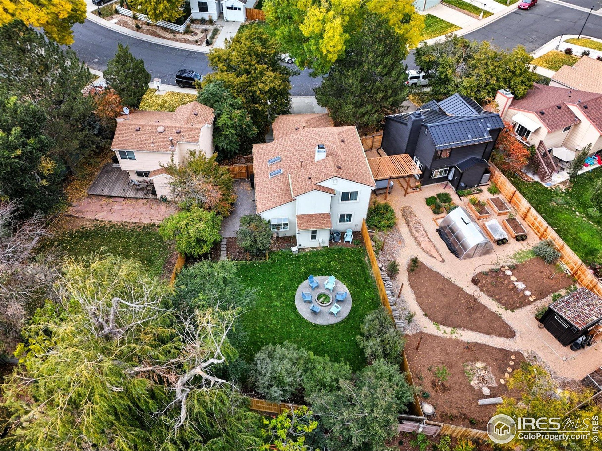 1812 Rice Street Longmont, CO 80501 - Photo 39 of 44 an aerial view of a house with a garden