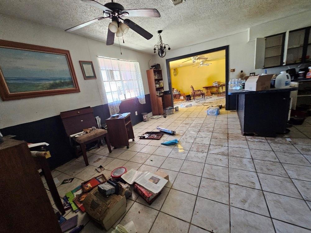 109 South Driskell Crowley, TX 76036 - Photo 3 of 7 a living room with furniture and a flat screen tv