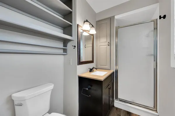 a view of kitchen with wooden floor