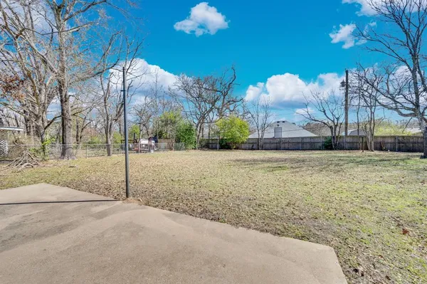 an aerial view of residential building with parking space