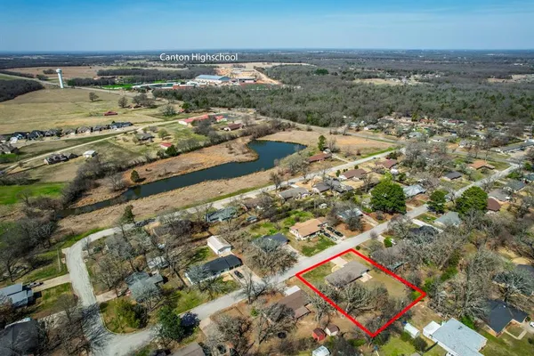 an aerial view of residential building with parking space