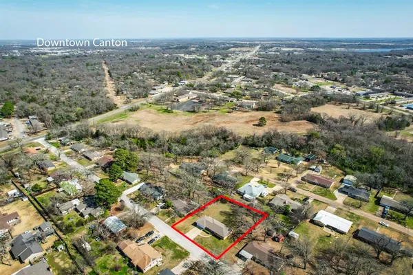 an aerial view of residential house with outdoor space