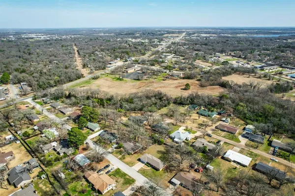 an aerial view of residential house with outdoor space