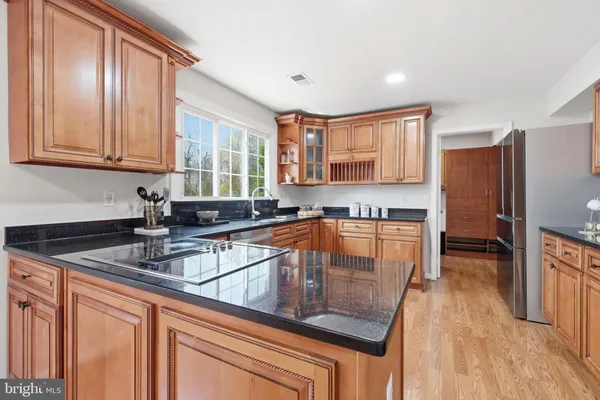 a bedroom with a bed and a table in it