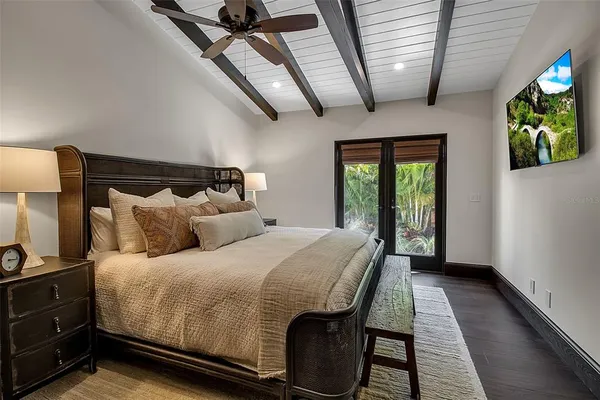 a view of an entryway with flower pots
