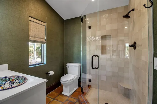 a view of entryway livingroom and hall with wooden floor
