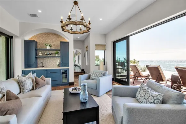 a front view of house with outdoor seating