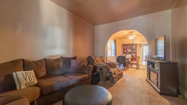 a view of a dining room with furniture and window