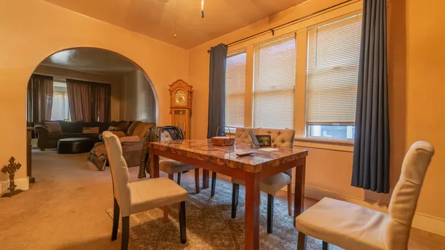 a bedroom with a bed and a book shelf