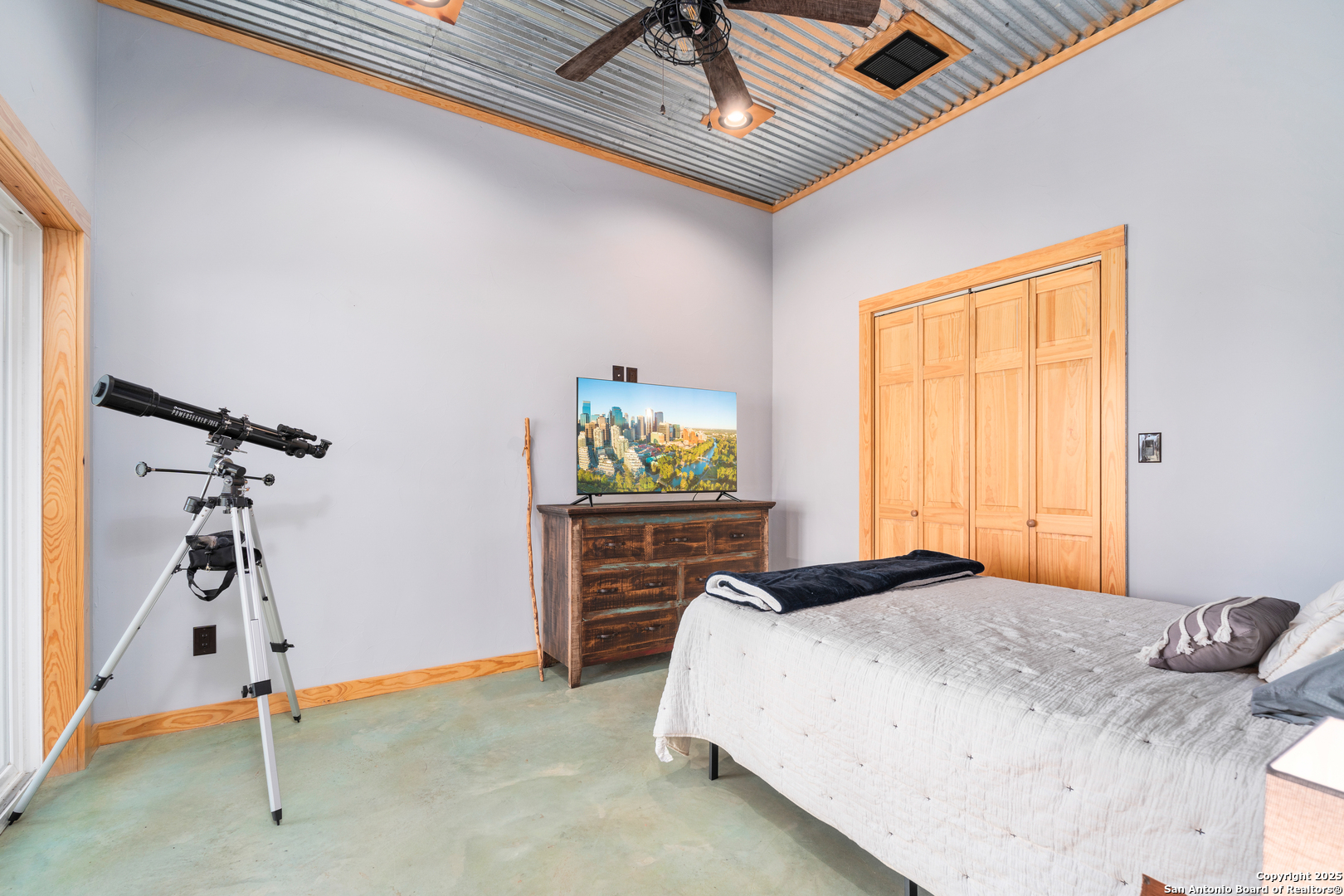 1110 Grandview Circle Bandera, TX 78003 - Photo 17 of 45 a bedroom with a bed and a window