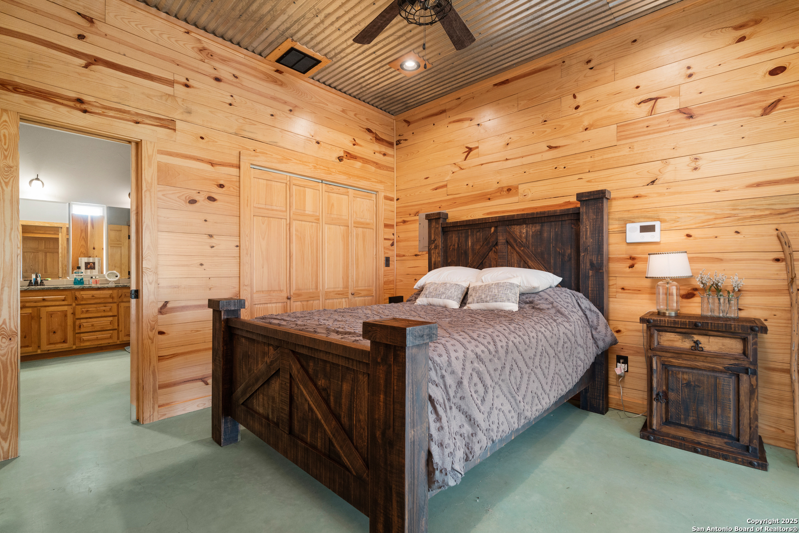 1110 Grandview Circle Bandera, TX 78003 - Photo 19 of 45 a bed room with a bed and a television