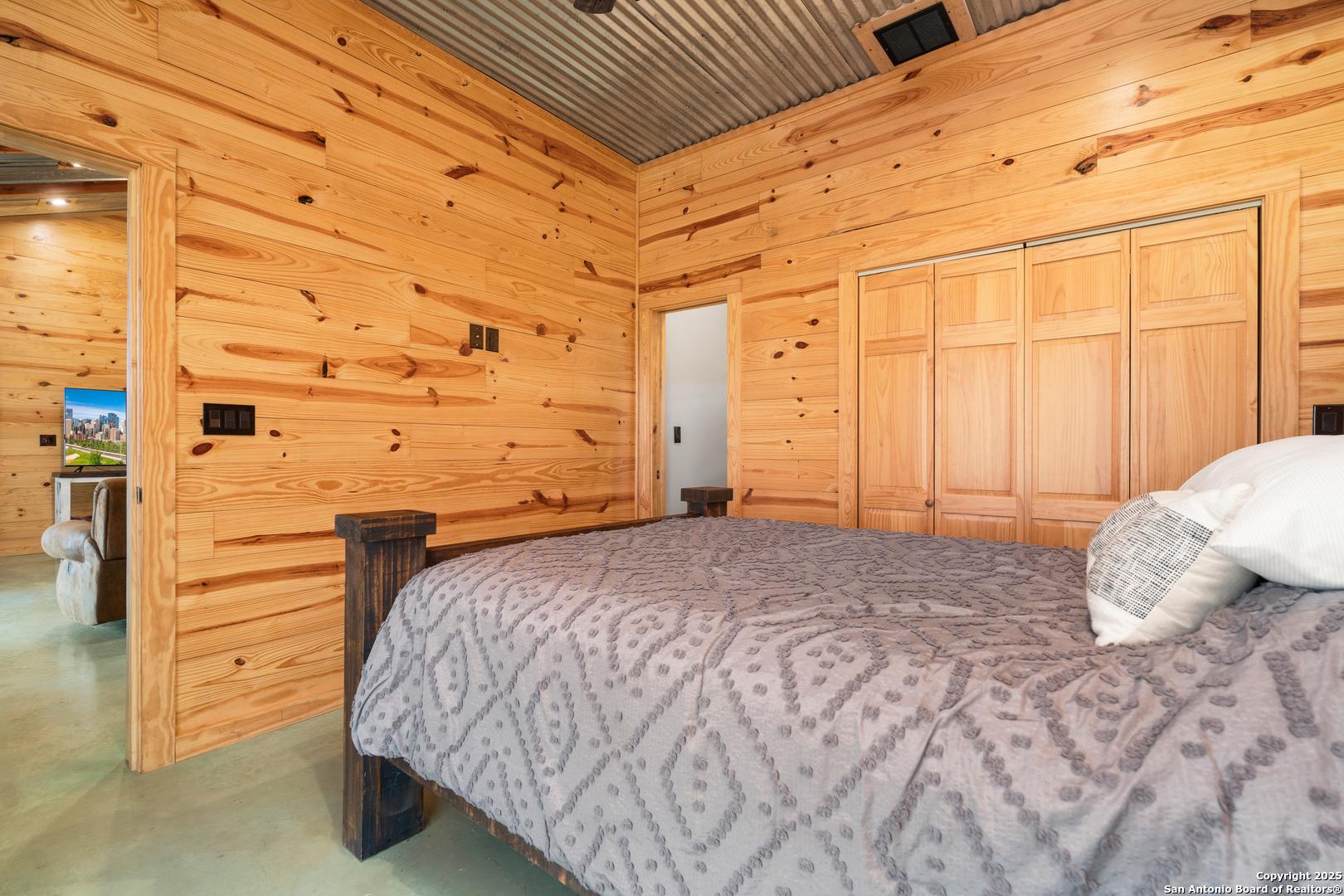 1110 Grandview Circle Bandera, TX 78003 - Photo 20 of 45 a bedroom with a bed and a table