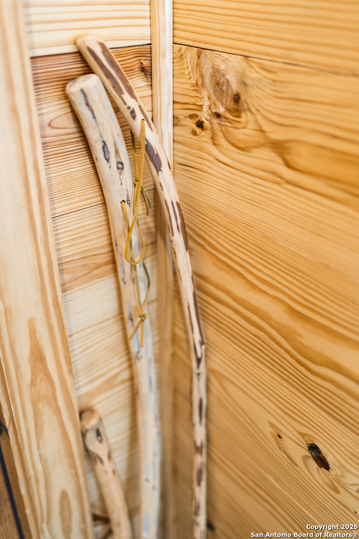 1110 Grandview Circle Bandera, TX 78003 - Photo 40 of 45 a view of a balcony with wooden floor and door