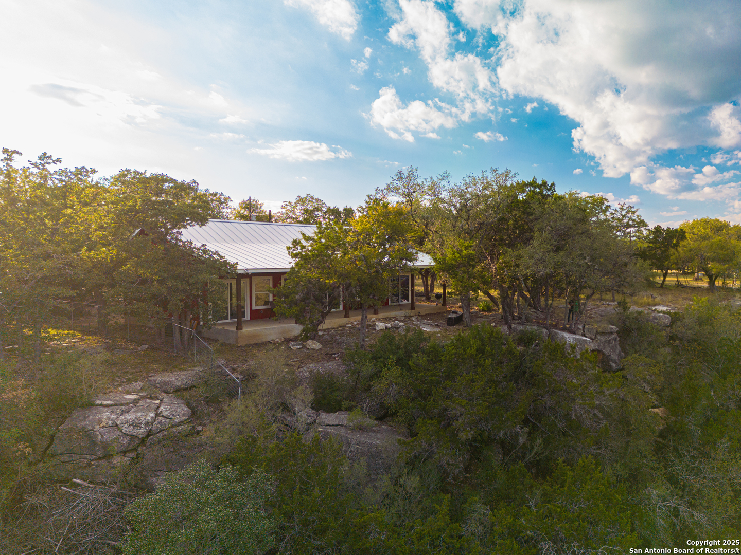 1110 Grandview Circle Bandera, TX 78003 - Photo 43 of 45 a view of a lake in middle of forest