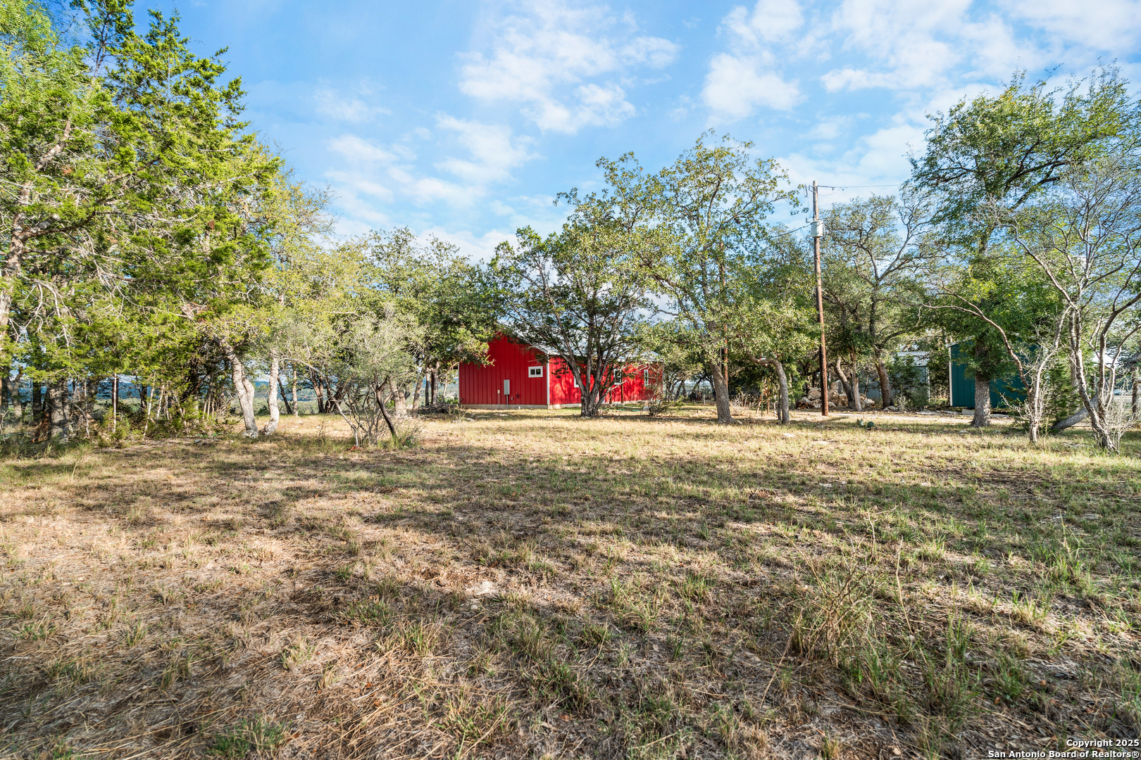 1110 Grandview Circle Bandera, TX 78003 - Photo 5 of 45 a view of road with trees
