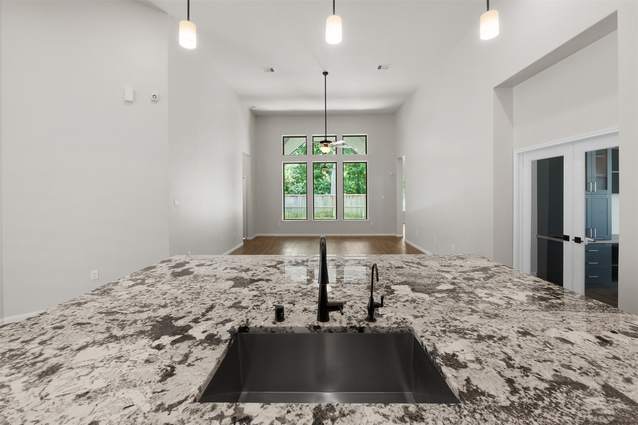 8022 McKittrick Ridge Drive Porter, TX 77365 - Photo 6 of 44 Texas sized island in Kitchen