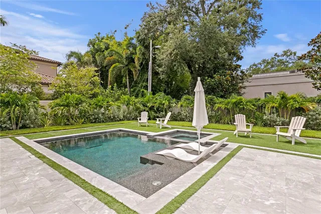 a room with a table and workspace