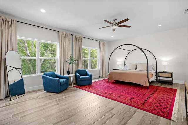 an aerial view of a house with outdoor space and street view