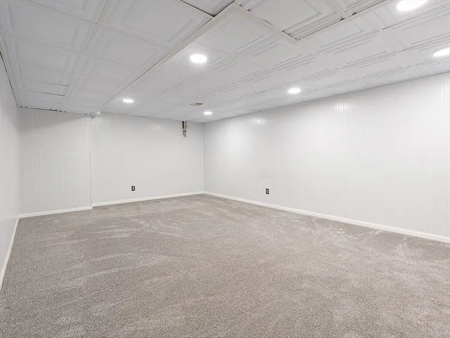 an empty room with a projector