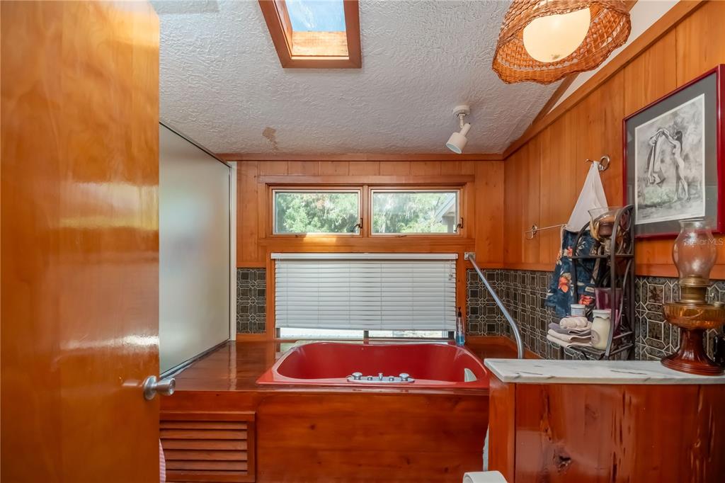 15615 Northeast 21st Avenue Road Citra, FL 32113 - Photo 21 of 98 a room with furniture and a window