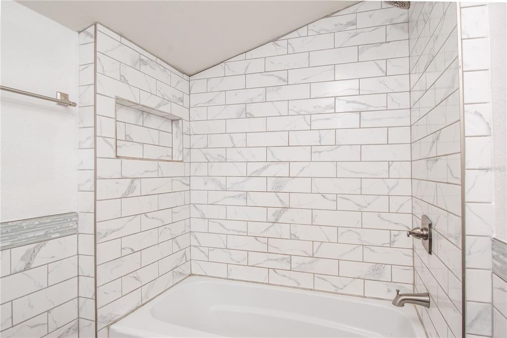 15615 Northeast 21st Avenue Road Citra, FL 32113 - Photo 69 of 98 a bathroom with a shower