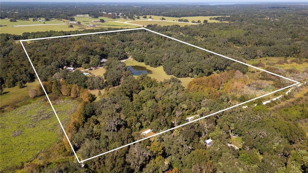 15615 Northeast 21st Avenue Road Citra, FL 32113 - Photo 89 of 98 a view of a balcony with an ocean