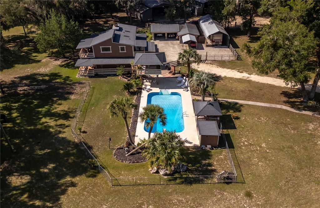 15615 Northeast 21st Avenue Road Citra, FL 32113 - Photo 93 of 98 an aerial view of a house with a yard