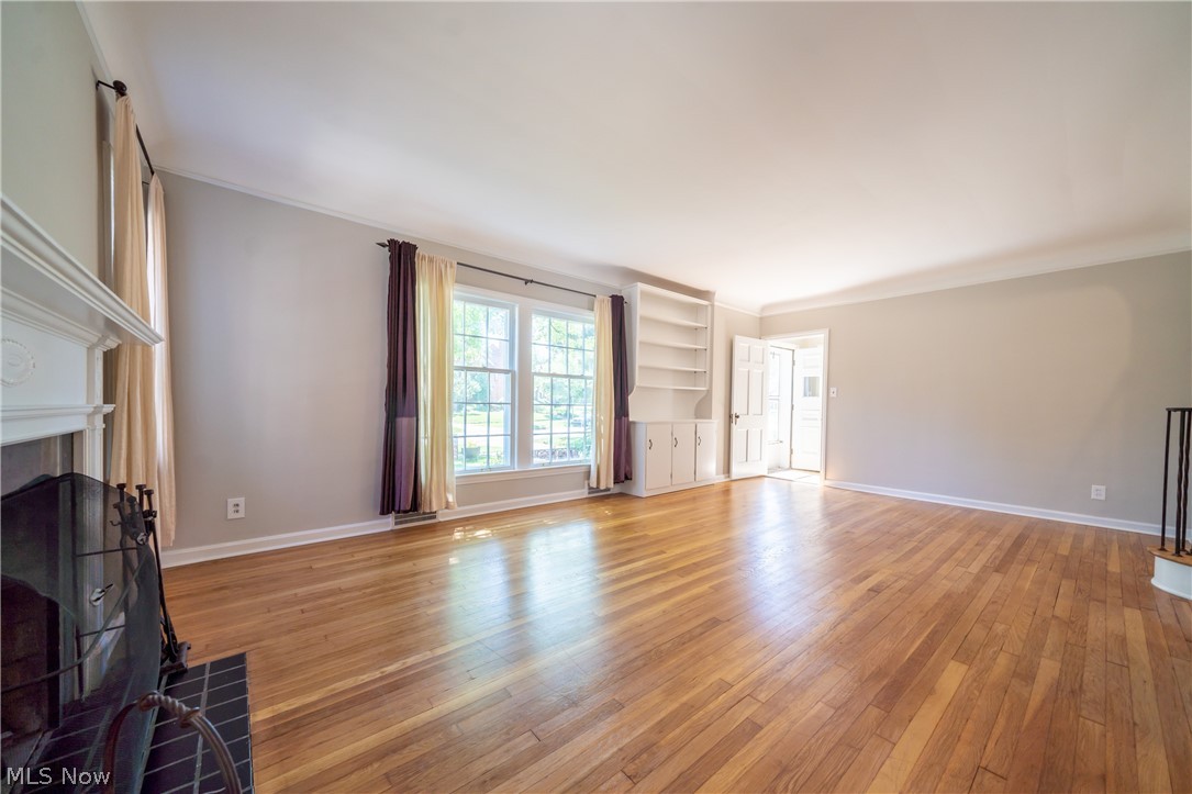 2552 Traymore Road Cleveland, OH 44118 - Photo 6 of 35 Another look at the Living Room with its large windows. Like most of the house interior it is newly painted in today's soothing colors
