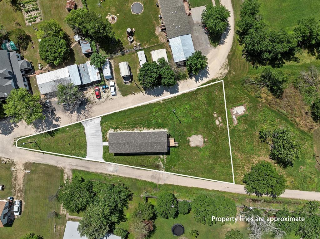 202 6th Street Mount Calm, TX 76673 - Photo 5 of 23 an aerial view of a house