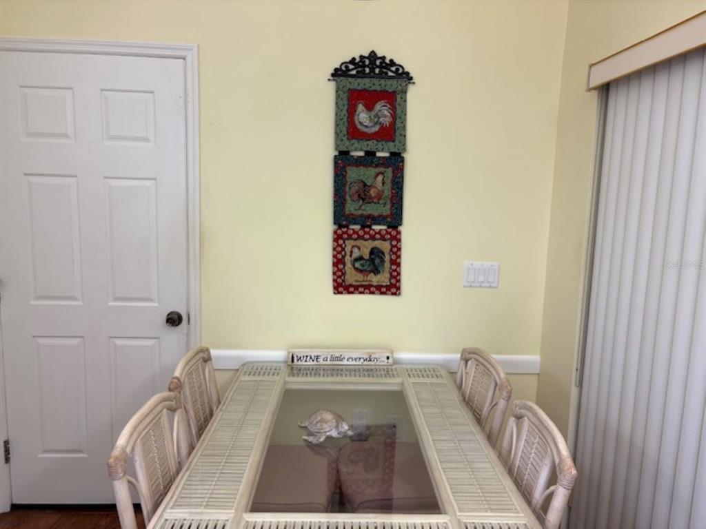 7867 Southwest 115th Loop Ocala, FL 34476 - Photo 17 of 40 a room with a couch and a rug