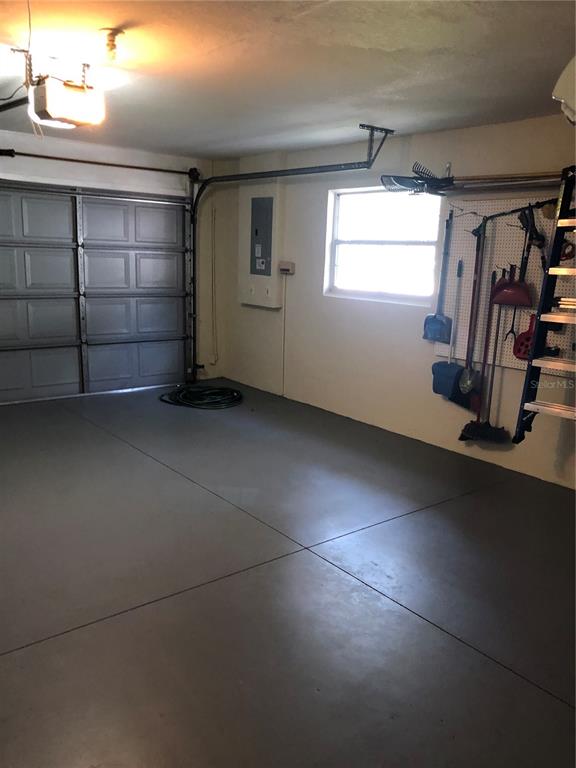 7867 Southwest 115th Loop Ocala, FL 34476 - Photo 40 of 40 a view of a room with gym equipment